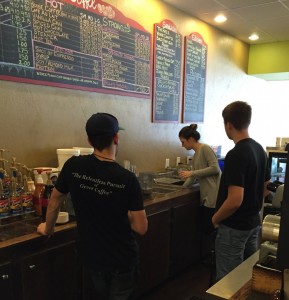 New baristas Victoria and Jordan getting into the swing of things as Joe explains the fine points of making the delicious Iced Chai enjoyed by so many of the Bella Family.