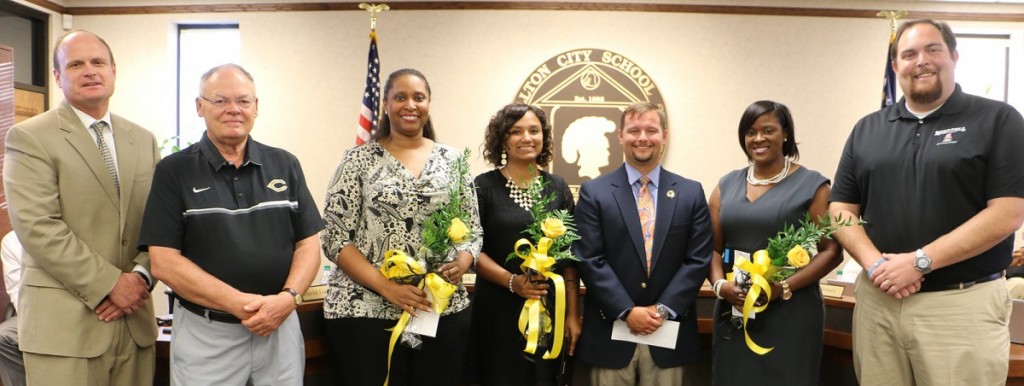 Following the announcement of Tabitha Walker as the 2016-2017 CCS Teacher of the Year, Zack Bell, right, of sponsor Mike Bell Chevrolet, presented gifts to the four teachers. From left are Dr. Mark Albertus, CCS superintendent; Dr. Jimmy Pope, board chairman; Dr. Valerie Moss, CHS TOTY; Tabitha Walker, CCS and CES Teacher of the Year; Luke Young, CJHS TOTY; and Tanish Springer, CMS TOTY.