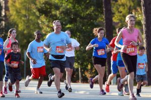 University of West Georgia President Kyle Marrero joins other runners in the university’s Third Annual Presidential 5K Spirit Run, which brought in more than $4,000 for the Carrollton GreenBelt. More than 220 adults and children participated in the Oct. 20 event on the university’s campus. In partnership with the University of West Georgia (UWG), Tanner Health System’s Get Healthy, Live Well hosted a 1-mile Superhero Fun Run.